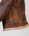 Genuine leather jacket with shearling details and interior.
